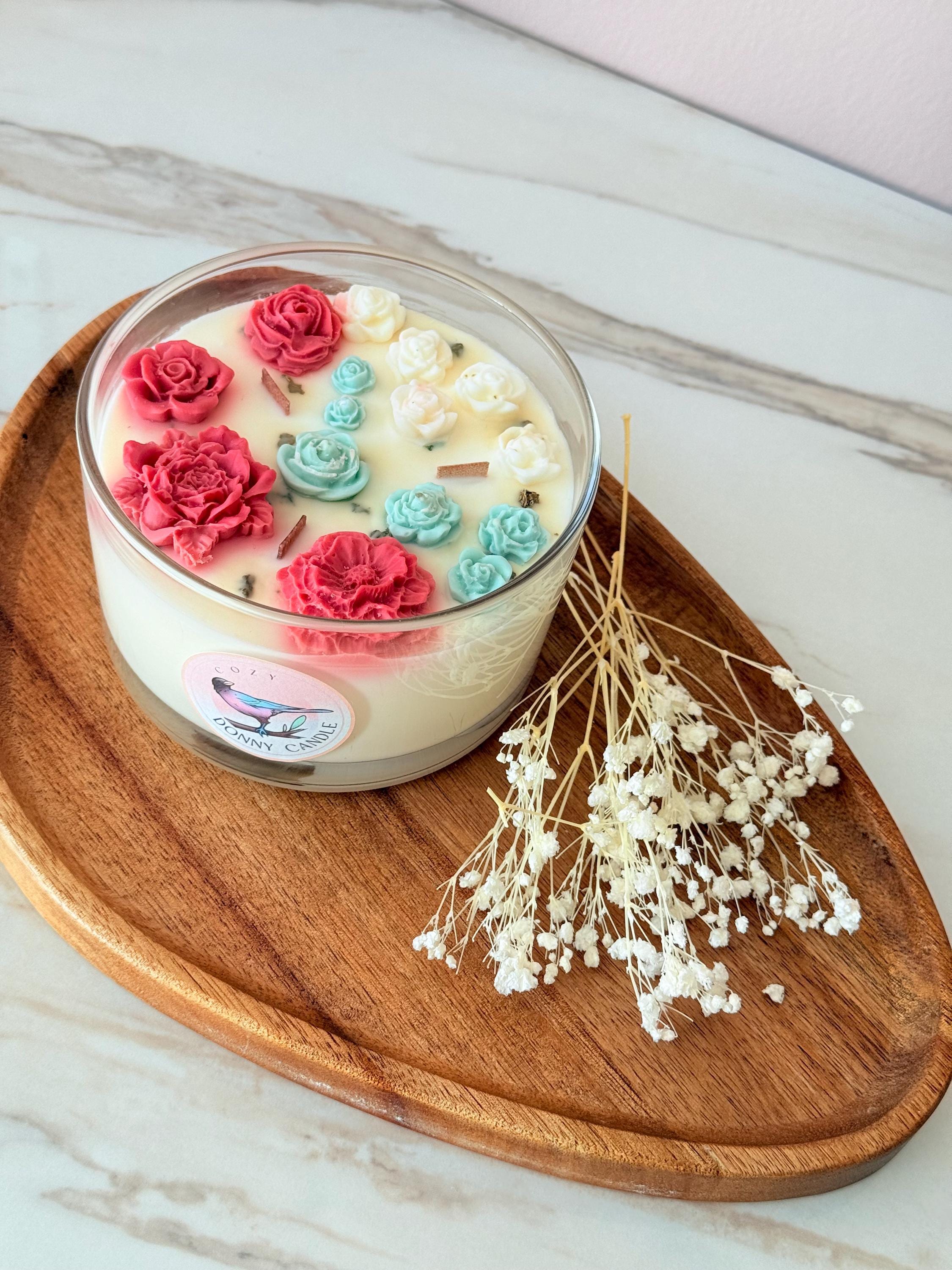 Handmade soy wax candle with wooden wick in a warm vanilla and sandalwood blend. Eco-friendly, vegan, and long-burning, this natural scented candle fills any room with a cozy, relaxing fragrance. The crackling wooden wick creates a calming atmosphere, perfect for home décor, self-care rituals, or thoughtful gifts. Packaged in a reusable jar, this toxin-free candle makes a luxury gift for him, her, or any occasion.