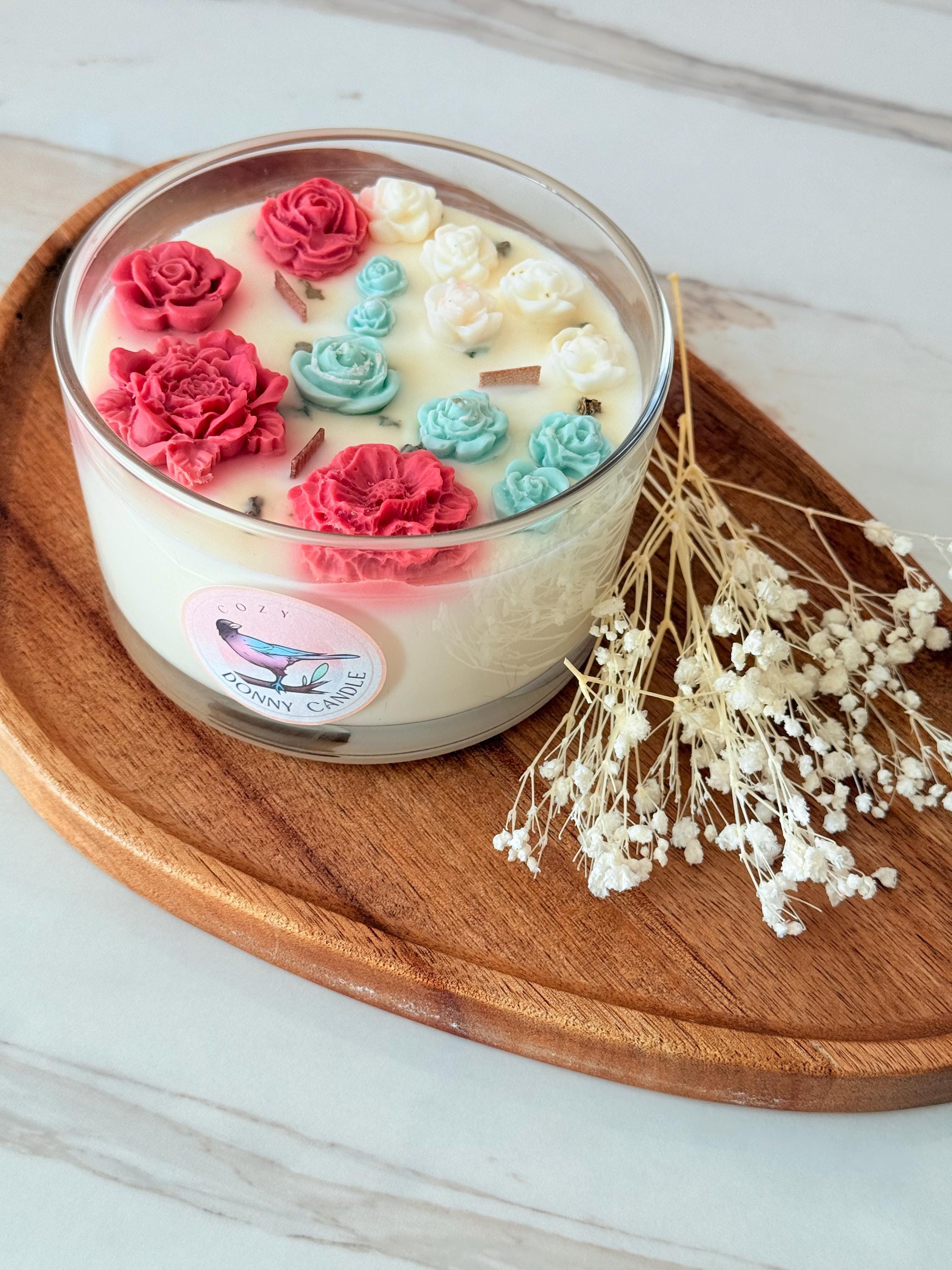 Handmade soy wax candle with wooden wick in a warm vanilla and sandalwood blend. Eco-friendly, vegan, and long-burning, this natural scented candle fills any room with a cozy, relaxing fragrance. The crackling wooden wick creates a calming atmosphere, perfect for home décor, self-care rituals, or thoughtful gifts. Packaged in a reusable jar, this toxin-free candle makes a luxury gift for him, her, or any occasion.