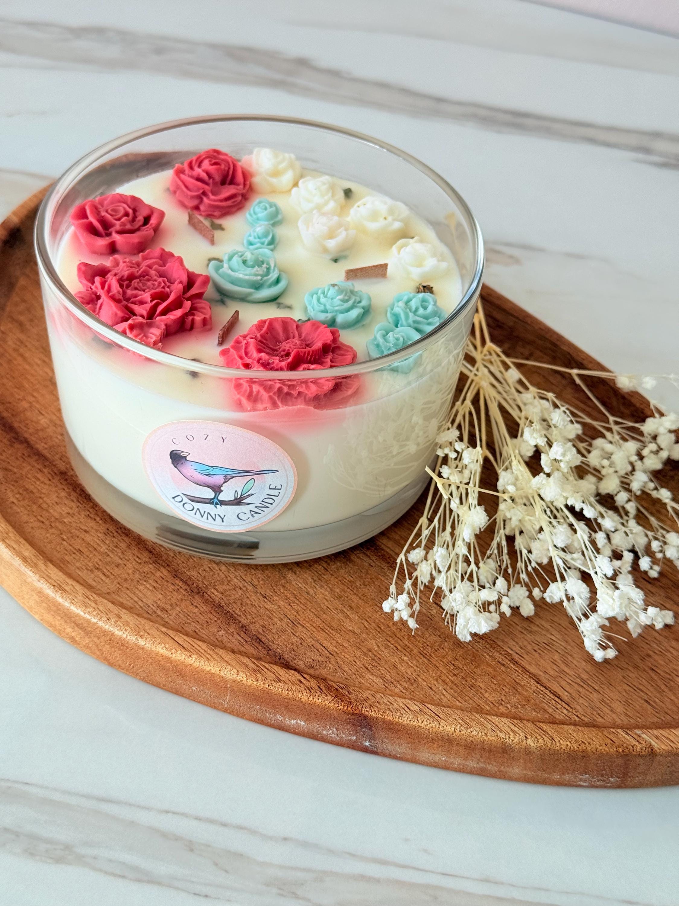 Handmade soy wax candle with wooden wick in a warm vanilla and sandalwood blend. Eco-friendly, vegan, and long-burning, this natural scented candle fills any room with a cozy, relaxing fragrance. The crackling wooden wick creates a calming atmosphere, perfect for home décor, self-care rituals, or thoughtful gifts. Packaged in a reusable jar, this toxin-free candle makes a luxury gift for him, her, or any occasion.